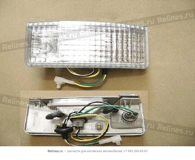 Фонарь заднего хода рамки номерного знака левый